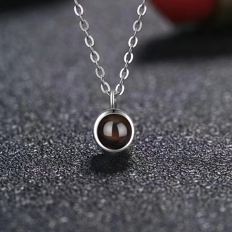 Classic Hollow Round Projection Necklace - JuVons