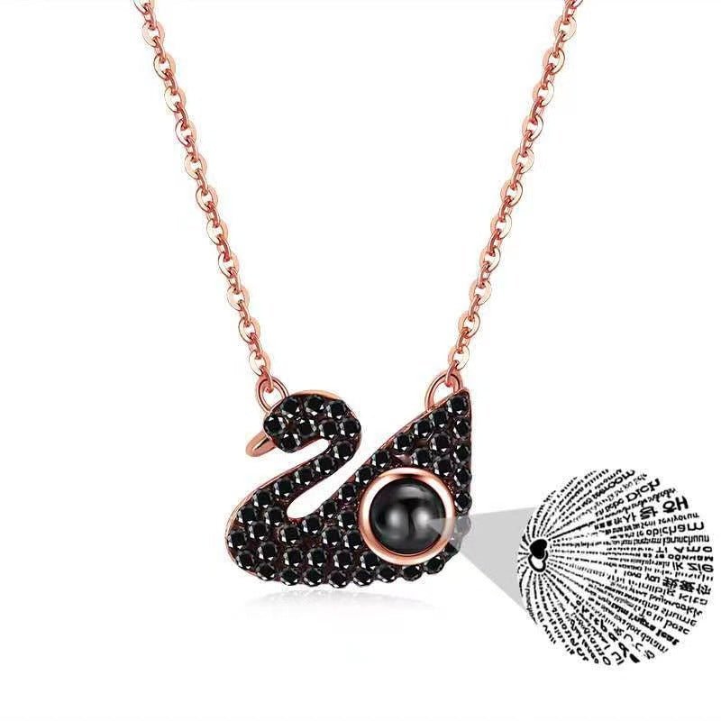 Exquisite dazzling black and white swan projection necklace - JuVons