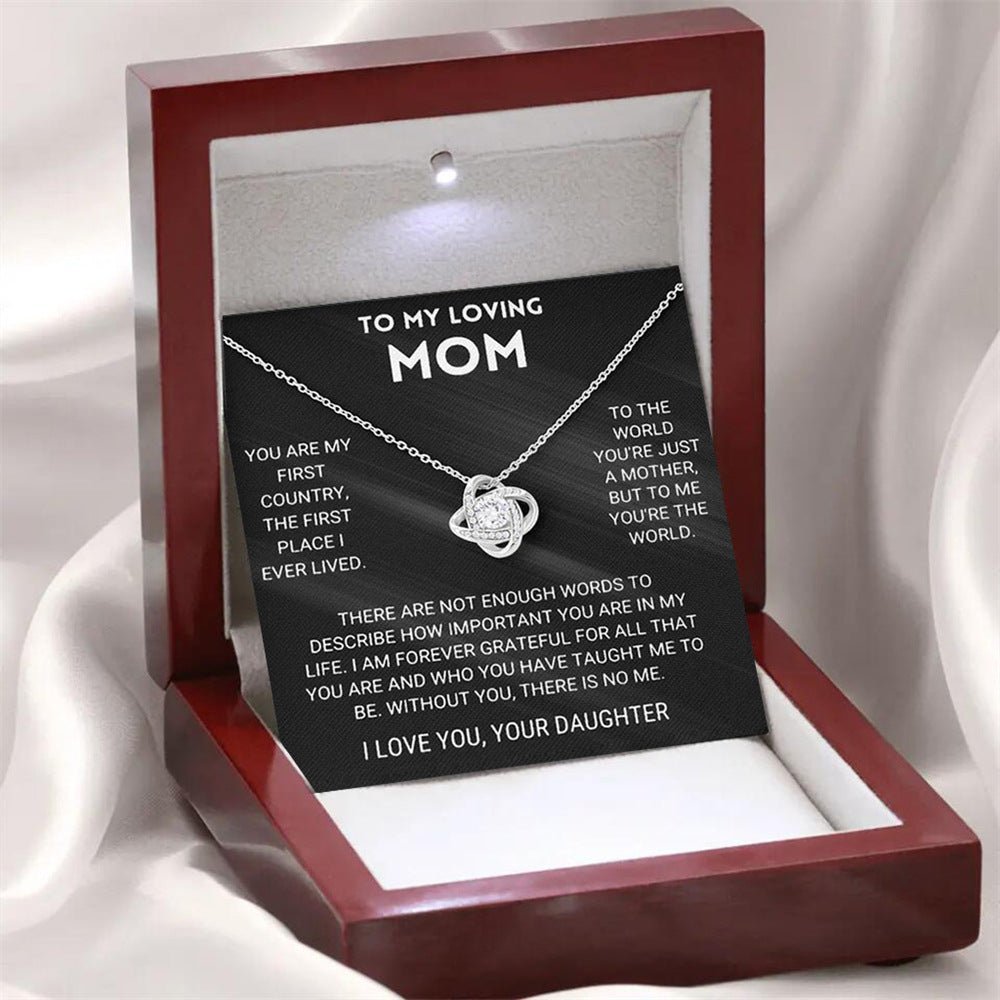 Noble four-leaf clover swirling diamond-encrusted gift box necklace for a great mother - JuVons