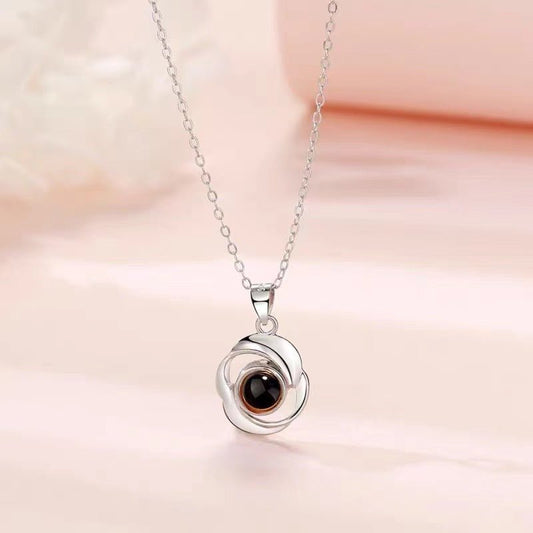 Trendy fashion rotating circular projection necklace - JuVons